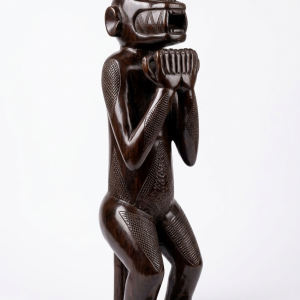 ebony stained hand carved seated primate